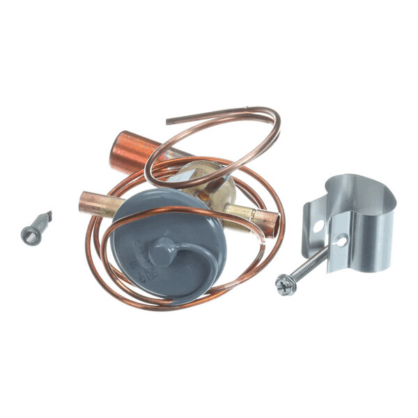 A coiled copper tube assembly with a gray circular component, accompanied by a metal clamp and a screw.