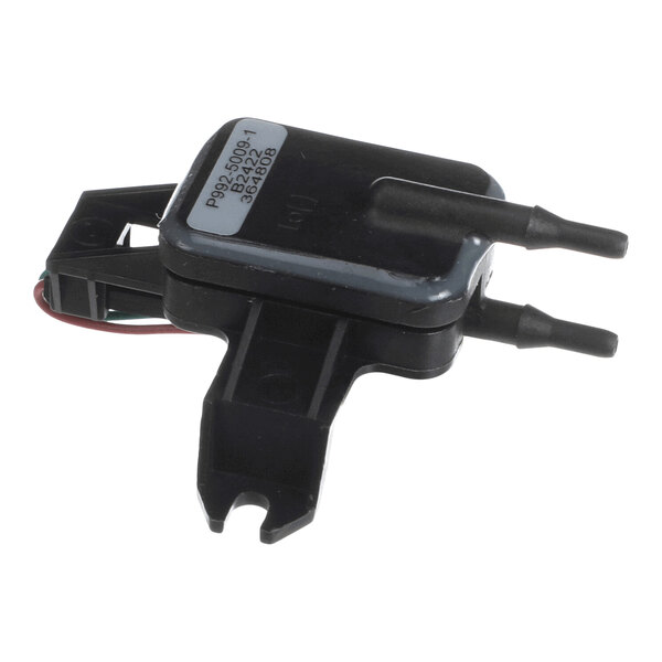 A small black electronic component with two protruding nozzles, a mounting bracket, and a label on top.
