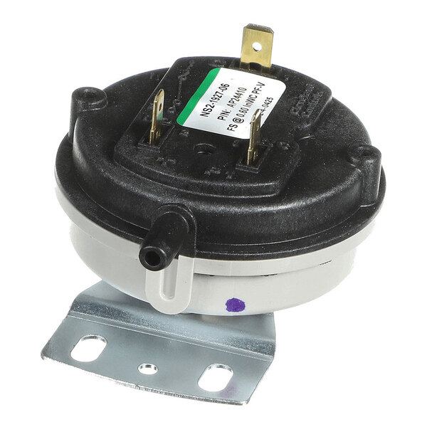 A round, black and silver component with two metal terminals, a plastic nozzle, and a mounting bracket, likely an electrical or mechanical switch.