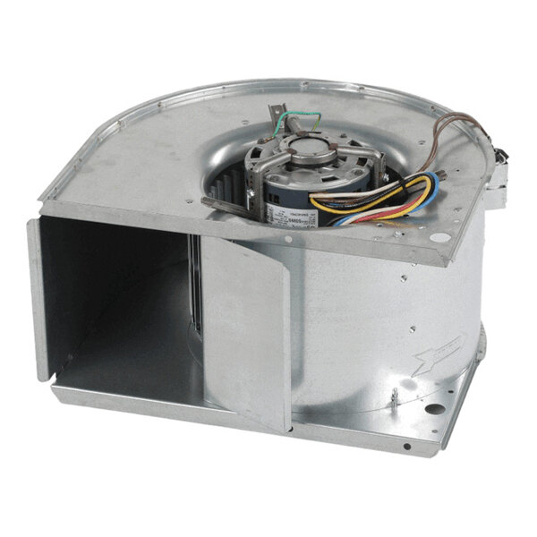 A metal blower assembly with an electric motor, wiring, and a fan wheel housed in a curved metal casing.