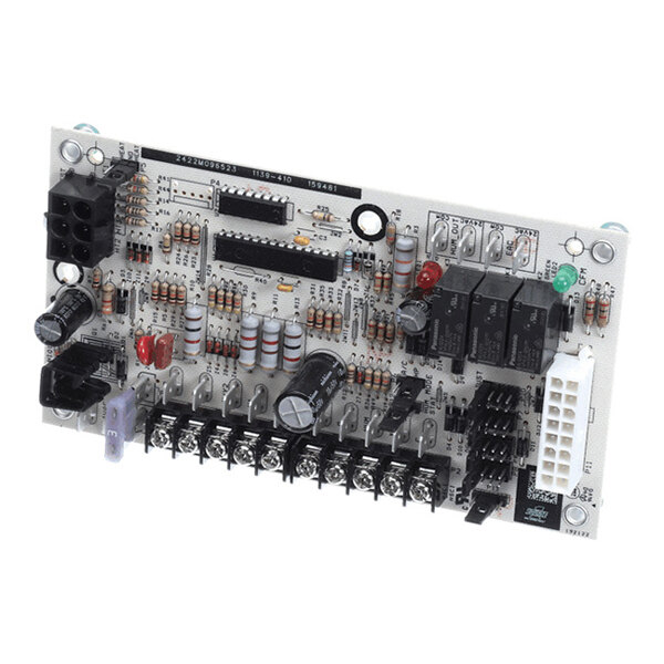 A rectangular electronic circuit board with various components including capacitors, resistors, relays, connectors, and terminal blocks.