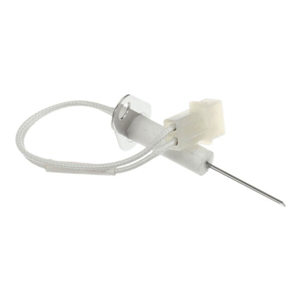 A small electronic component with a metal pin, a white plastic connector, and a braided wire loop.