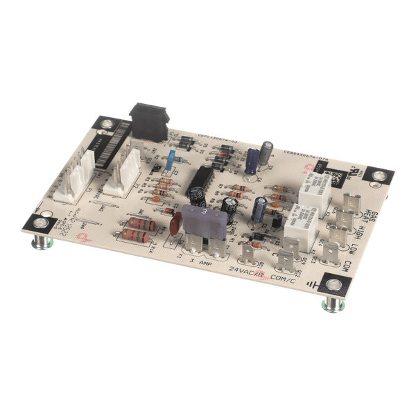 A rectangular electronic circuit board with various components such as capacitors, resistors, relays, connectors, and a fuse mounted on it.