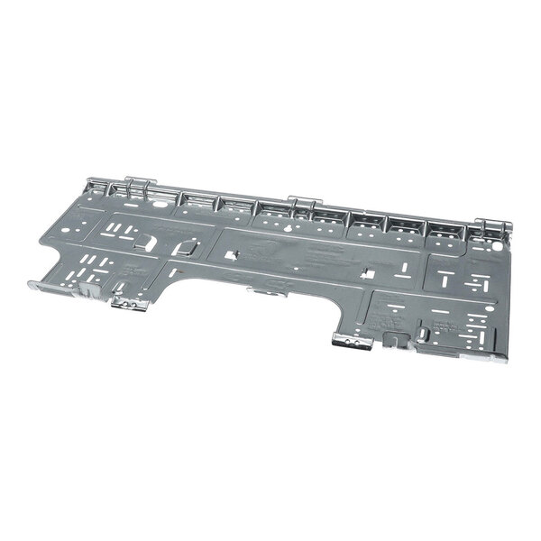 A flat, metallic mounting plate with various cutouts and raised sections, likely used for securing components in place.