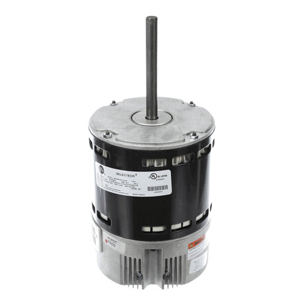 A cylindrical electric motor with a central shaft extending vertically from the top and ventilation openings around the body.