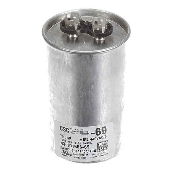 A cylindrical metal capacitor with two terminal connectors on top and a label displaying technical specifications.