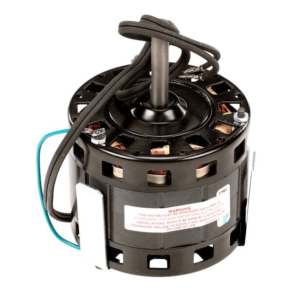 A cylindrical electric motor with a central shaft, visible wiring, and a warning label on the side.