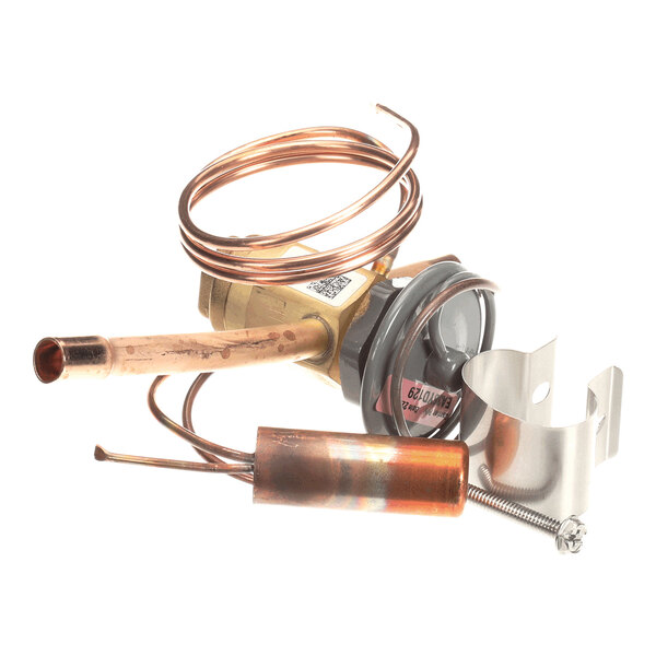 A brass and copper valve assembly with coiled tubing and a metal mounting bracket.