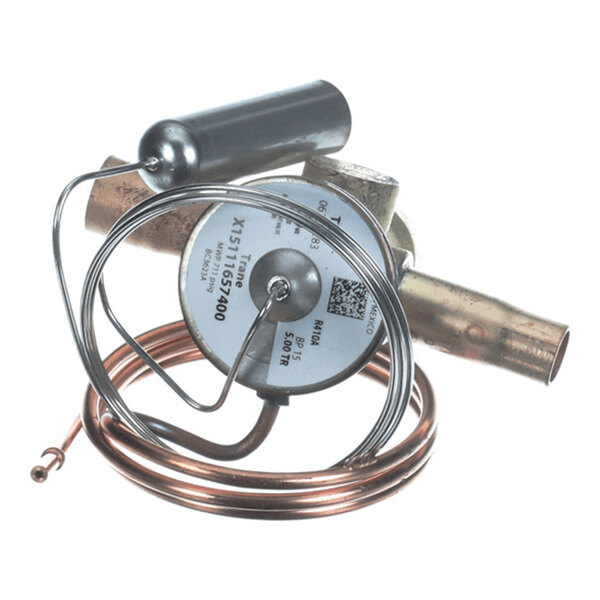 A metallic expansion valve with a coiled copper tube and cylindrical component attached.