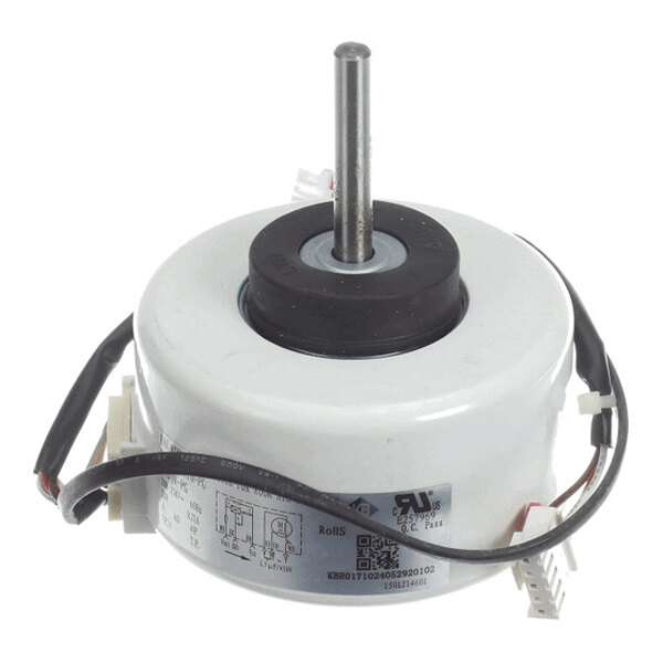A cylindrical electric motor with a central shaft, attached wires, and a label with technical information.