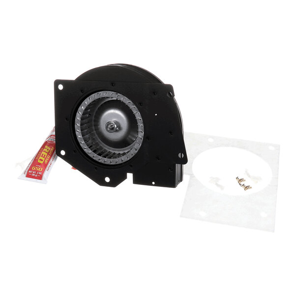 A black blower vent assembly with a visible fan wheel, accompanied by a tube of sealant, a white gasket, and several small screws.
