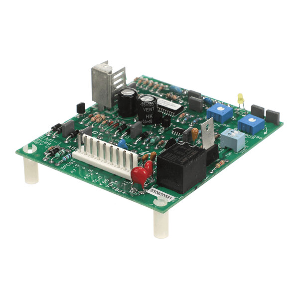A green printed circuit board with various electronic components, including capacitors, resistors, connectors, relays, and LEDs, mounted on plastic standoffs.