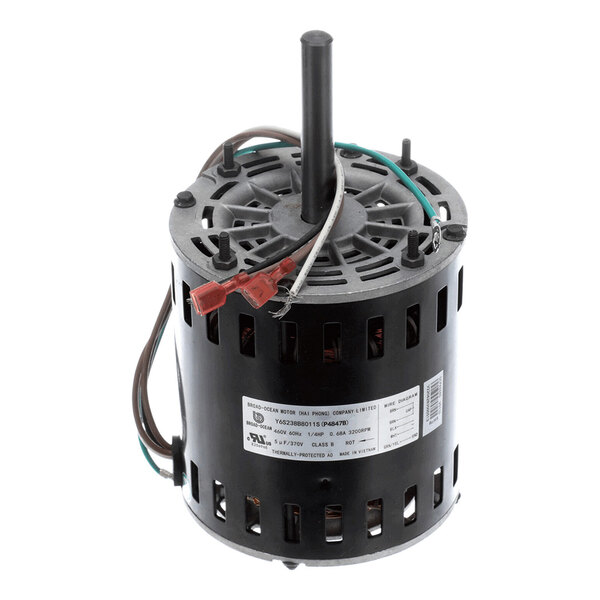 A cylindrical electric motor with a central shaft, visible wiring, and a label on the side.