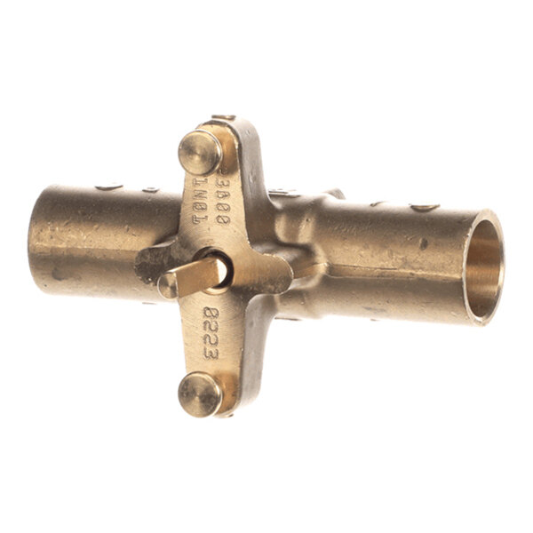 A brass T-shaped pipe fitting with a lever and engraved markings.