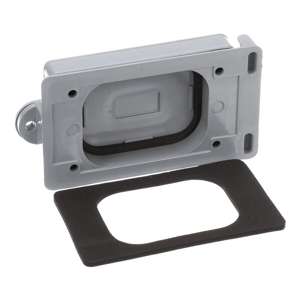 A rectangular gray plastic cover with an open center and a separate black gasket, likely designed to fit over an electrical component.