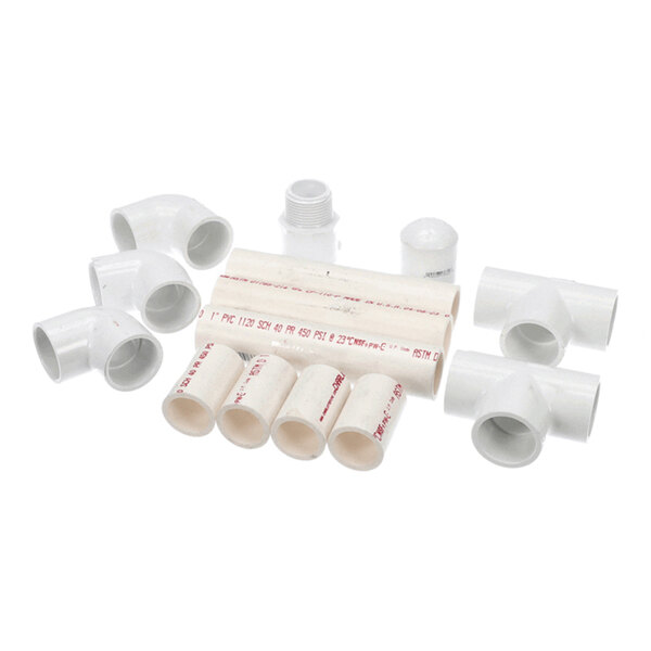A set of white PVC pipe fittings and connectors, including elbows, tees, couplings, and straight pipe sections, arranged on a white background.