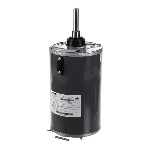A cylindrical electric motor with a metallic shaft protruding from the top and a label with specifications on the side.
