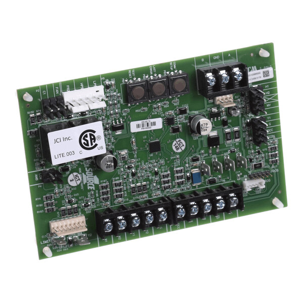 A green electronic circuit board with various components, connectors, and terminal blocks mounted on it.