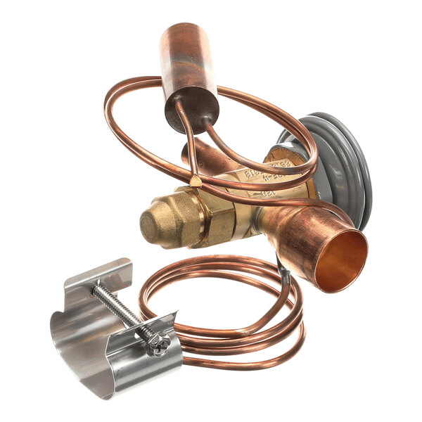 A brass and copper mechanical valve assembly with coiled tubing and a metal mounting bracket.