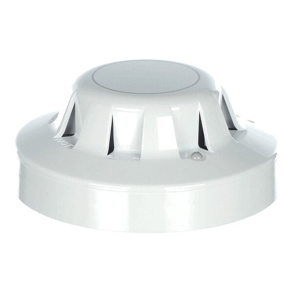 A white, round smoke detector with vent-like openings around its sides.