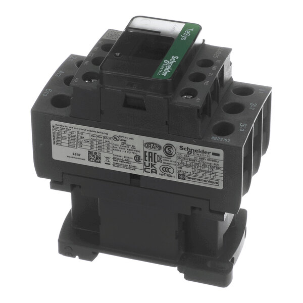 A black and gray electrical contactor with multiple connection points and a labeled panel, featuring a green Schneider Electric logo on top.