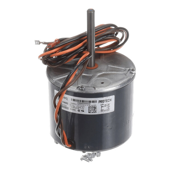 A cylindrical electric motor with a central shaft, attached wires, and a label on the side, shown with a few screws at the base.