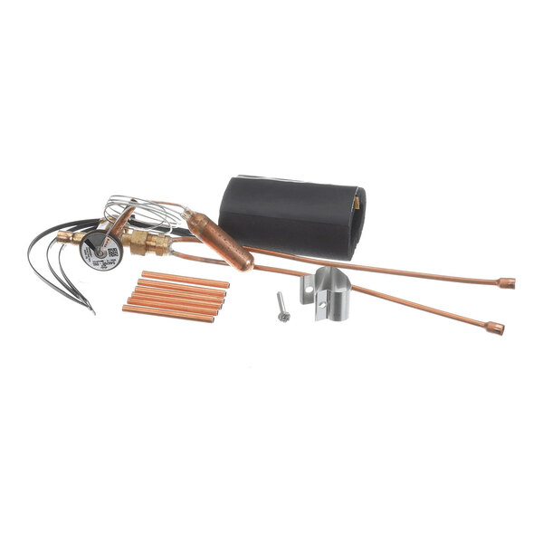 A collection of metal and copper components, including tubes, a valve, wires, a black cylindrical cover, and mounting hardware, arranged on a white background.