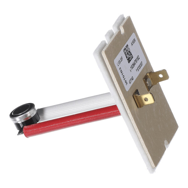 A rectangular electronic component with two metal prongs, a label with a barcode, and an attached cylindrical sensor on a red and white rod.