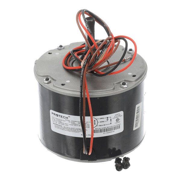 A cylindrical electric motor with attached wires and two screws placed in front of it.