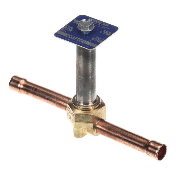 A brass and copper valve with a vertical metal stem and a blue identification tag on top.