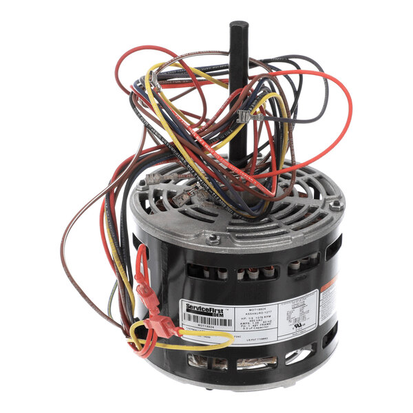 A cylindrical electric motor with multiple colored wires extending from the top and a central shaft.