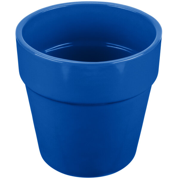 A cobalt blue cast aluminum round condiment bowl with a lid.