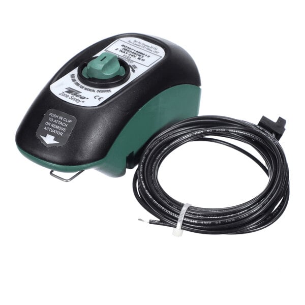 A black and green electronic actuator device with a rotary knob and an attached long black cable coiled beside it.