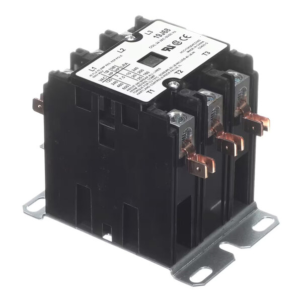 A black, box-shaped electrical contactor with three copper terminals and a white label on top, mounted on a metal base.