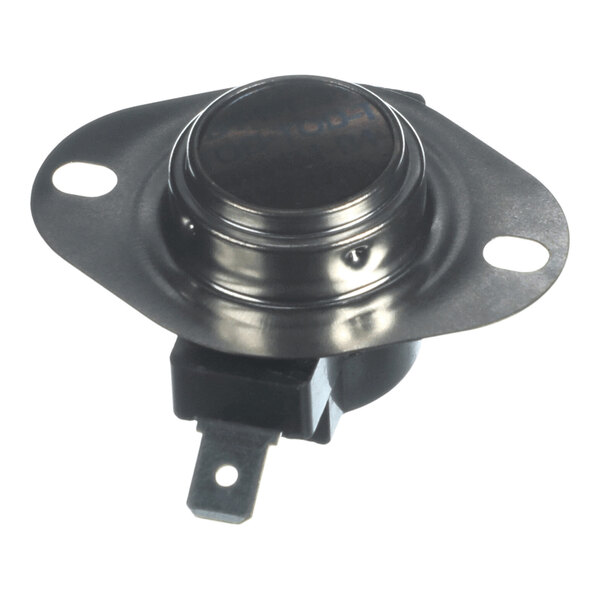 A metallic component with a round, raised center and two mounting holes, attached to a black plastic base with a metal terminal.