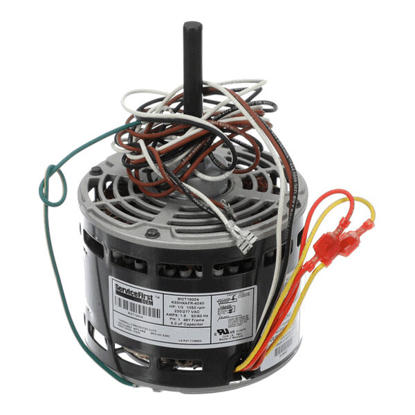 A cylindrical electric motor with multiple colored wires attached and a central shaft protruding from the top.