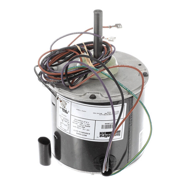 A cylindrical electric motor with multiple colored wires extending from the top and a central shaft protruding upward.