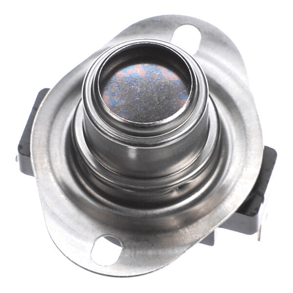 A close-up view of a metallic circular component with a flange and mounting holes, likely an electrical or mechanical part.