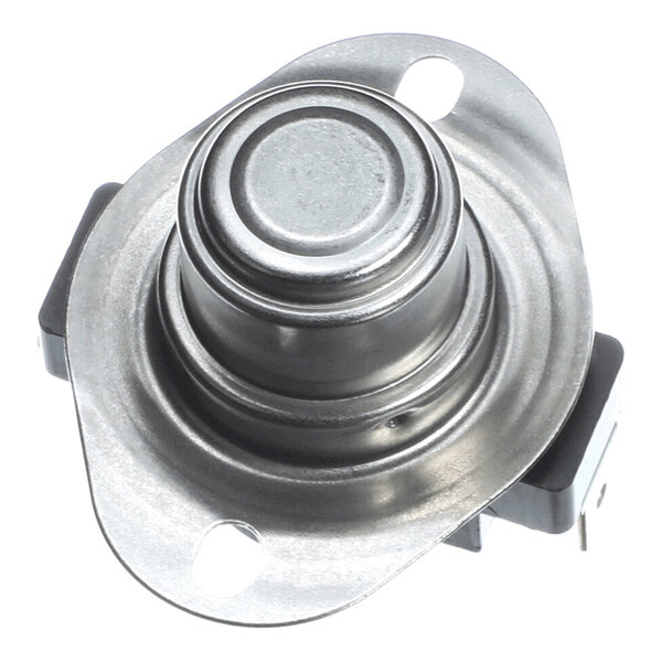 A metallic, round, and slightly domed component with two mounting holes and electrical terminals on the side, likely a temperature or limit switch.