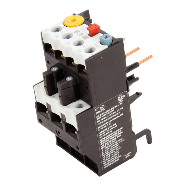 A black and white electrical relay component with multiple connection points, labeled dials, and copper prongs.