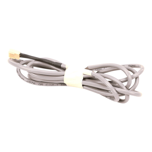A coiled gray cable with a small yellow connector at one end, secured with a white band.