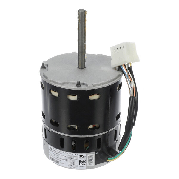 A cylindrical electric motor with a central shaft, multiple ventilation slots, and attached wiring with a white connector.