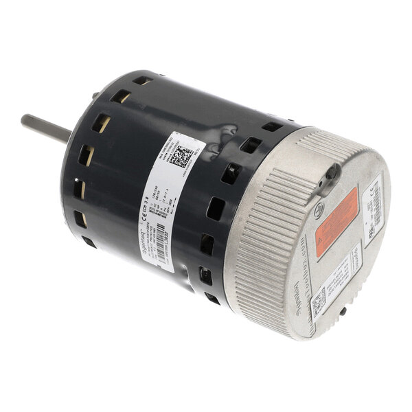 A cylindrical electric motor with a metal casing, ventilation slots, a protruding shaft, and several labels attached to its surface.