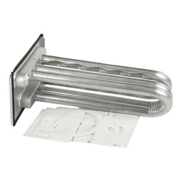 A metallic, tubular heat exchanger component with a rectangular mounting plate and several white gasket-like pieces placed beside it.