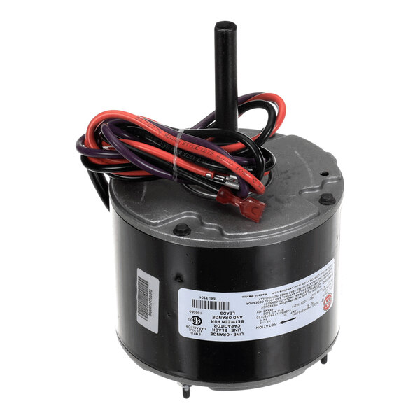 A cylindrical electric motor with a central shaft, attached wires, and a label on the side.