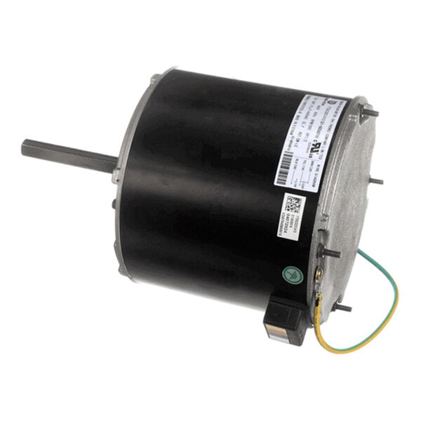 A cylindrical black electric motor with a protruding metal shaft, attached wires, and a label with technical specifications.