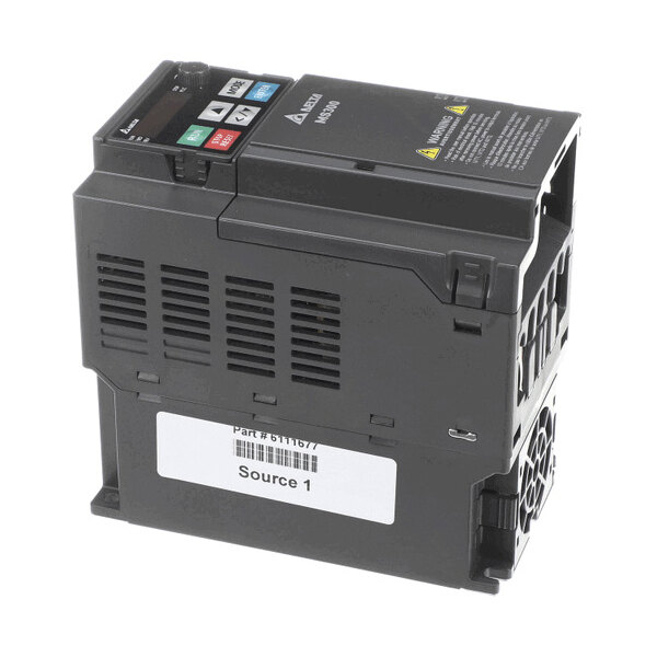 A black electronic device with a control panel featuring buttons and a display, ventilation slots, and a label reading 'Source 1' on the side.