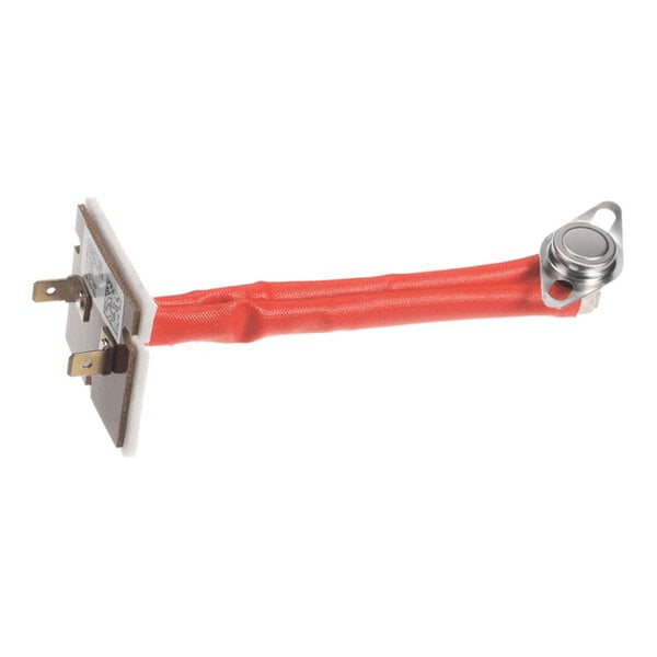 A metal and plastic electrical component with a red insulated wire connecting a flat terminal block to a round metal sensor.