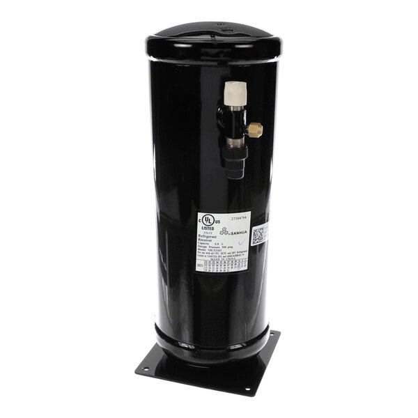 A black cylindrical metal component with a flat base, a label, and a valve fitting on the side.