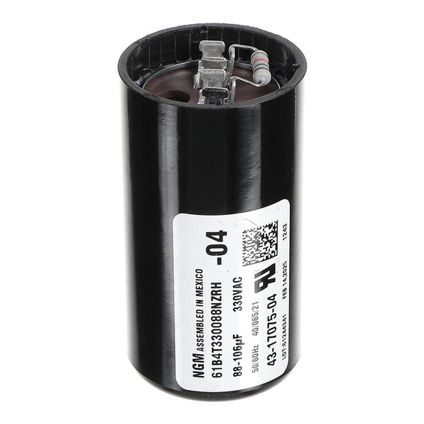 A cylindrical black capacitor with metal terminals and a white label displaying technical specifications.